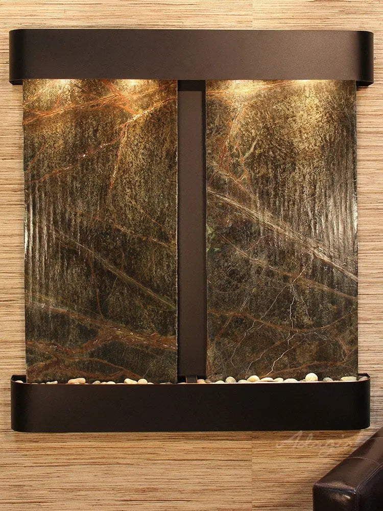 Wall-mounted water feature with marble-like design on a wooden background