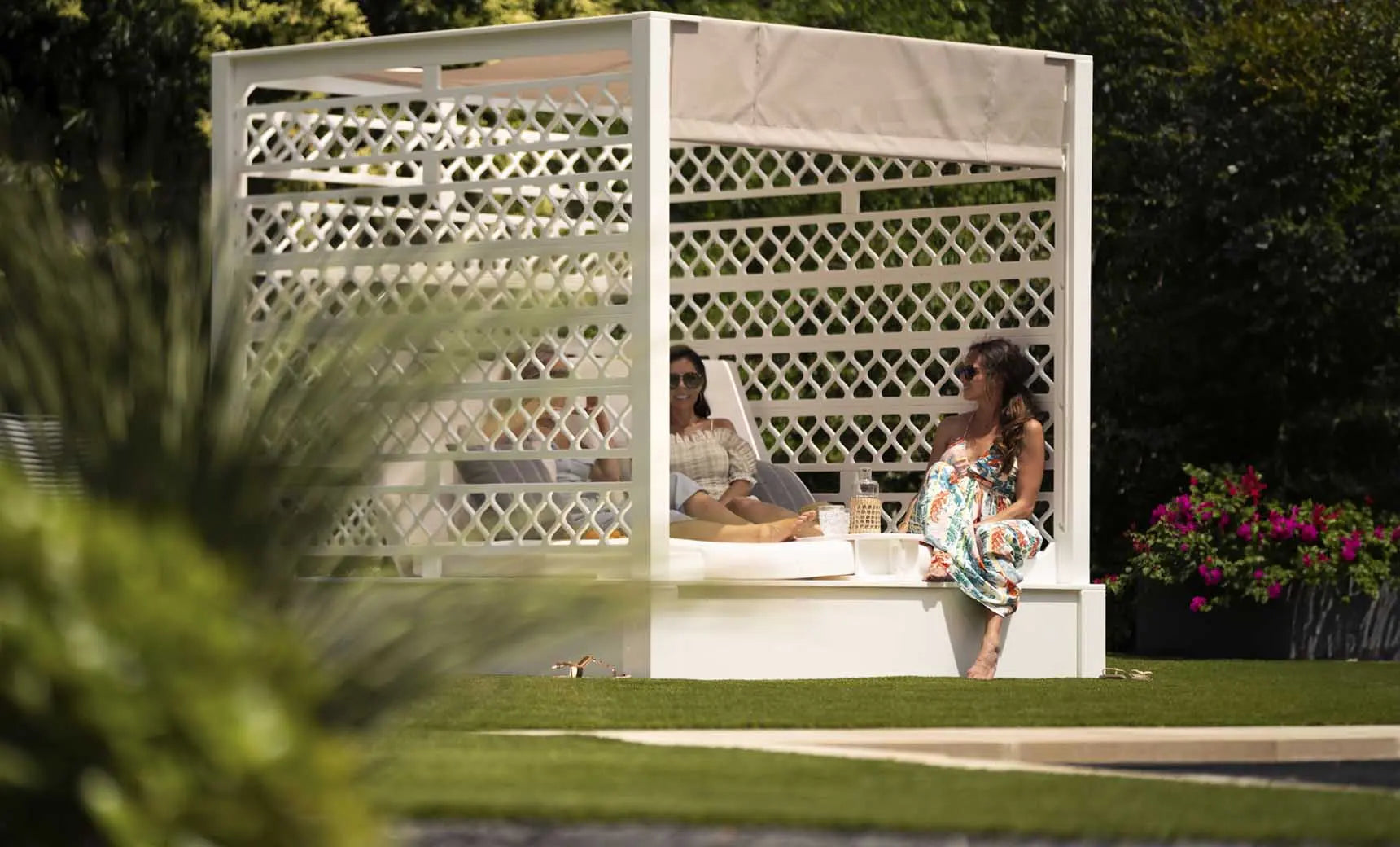 Shift Daybed featuring a sleek wooden frame with adjustable headrest and storage compartment underneath.
