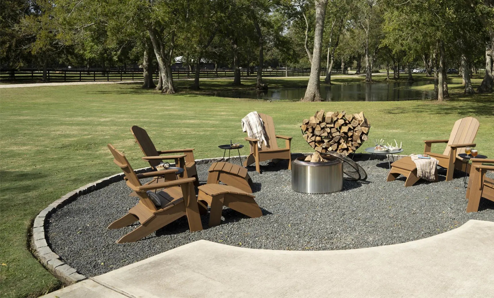 Legacy Adirondack wooden rocking chair with curved back and armrests