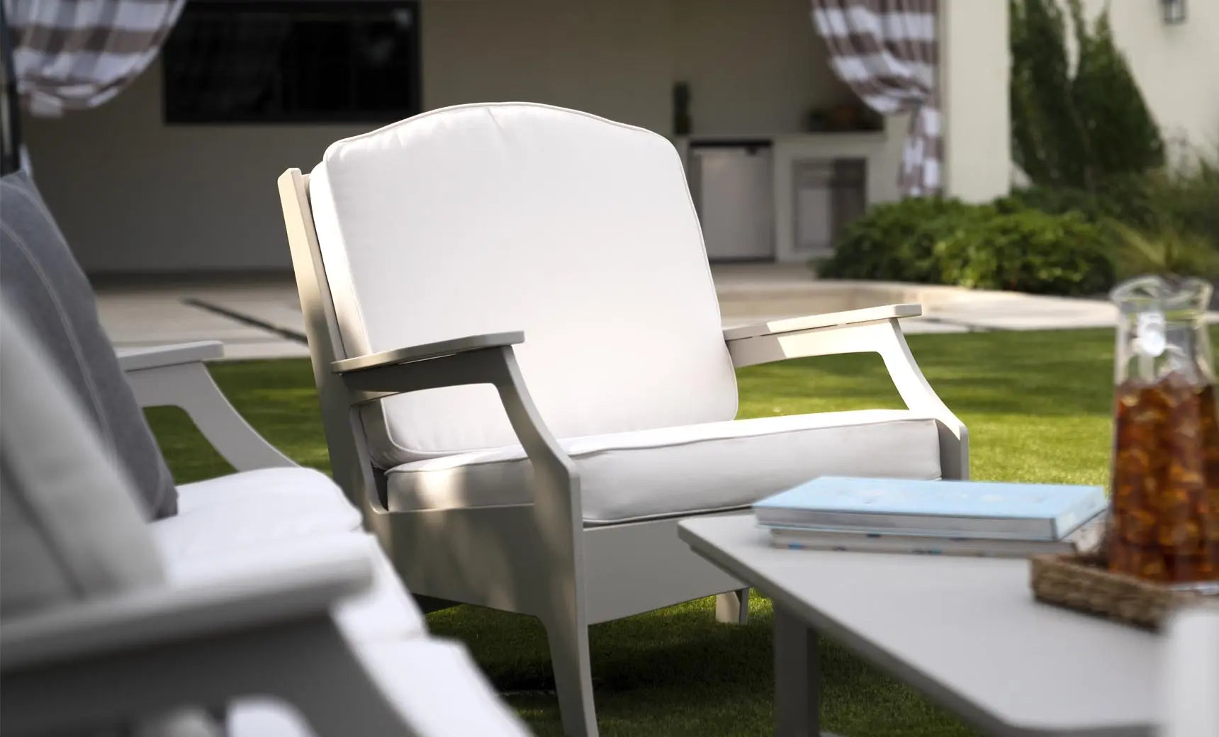 Legacy Club Chair in dark brown leather with curved arms and high backrest