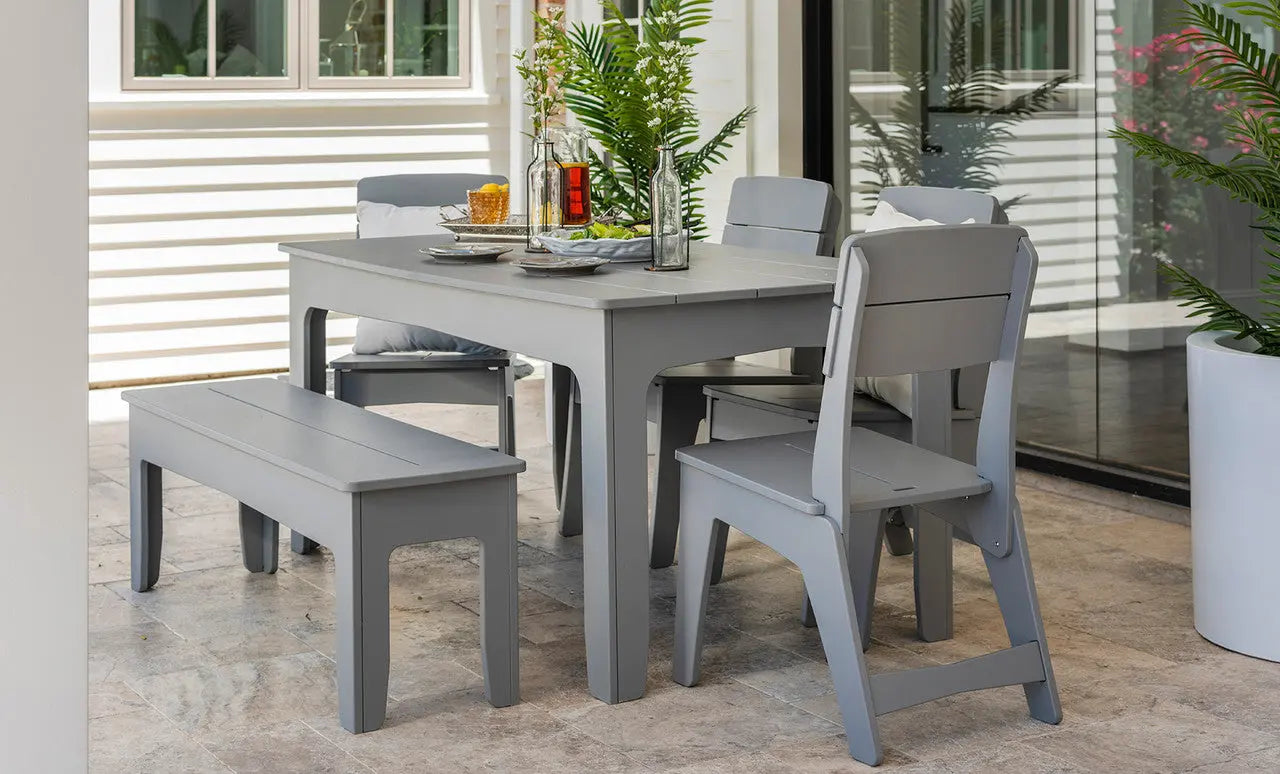 Mainstay wooden dining bench with slatted seat and four legs.