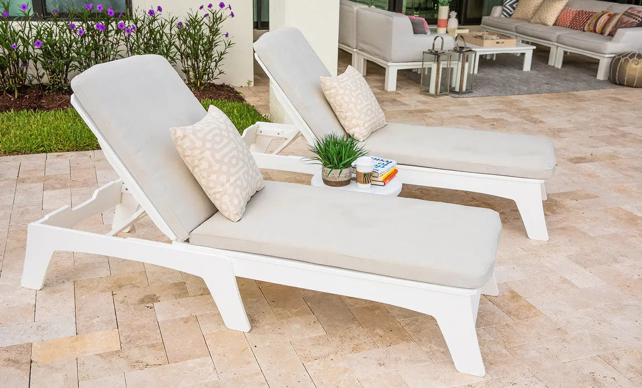 Mainstay chaise lounge cushion in soft fabric with ergonomic design and winged arms.