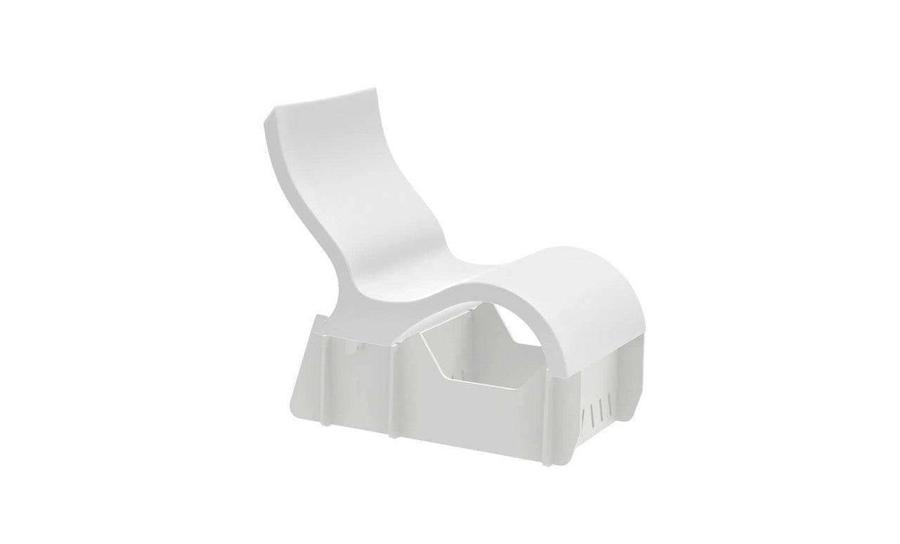 Signature Lowback chair elevated on a wooden riser with armrests and back support.