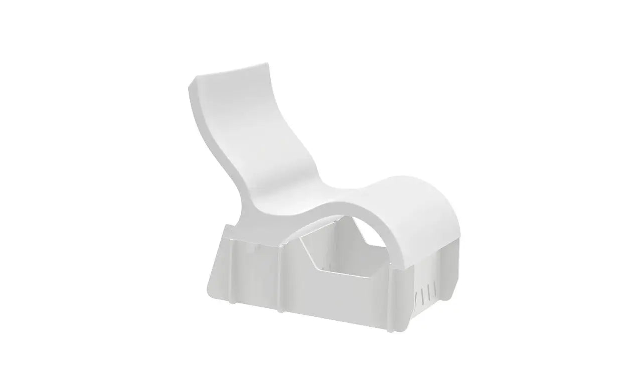 Signature Lowback chair elevated on a wooden riser with armrests and back support.