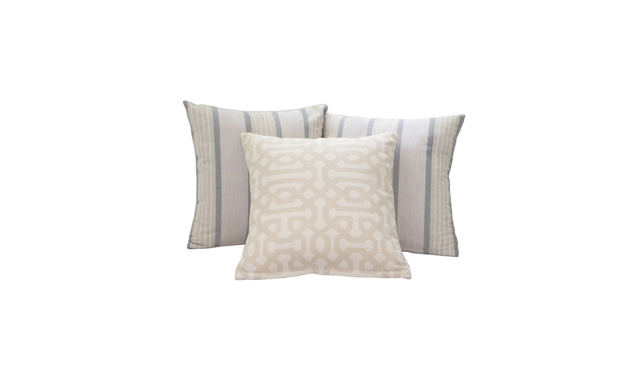 Two square throw pillows in a modern design, featuring geometric patterns in shades of blue and gray.