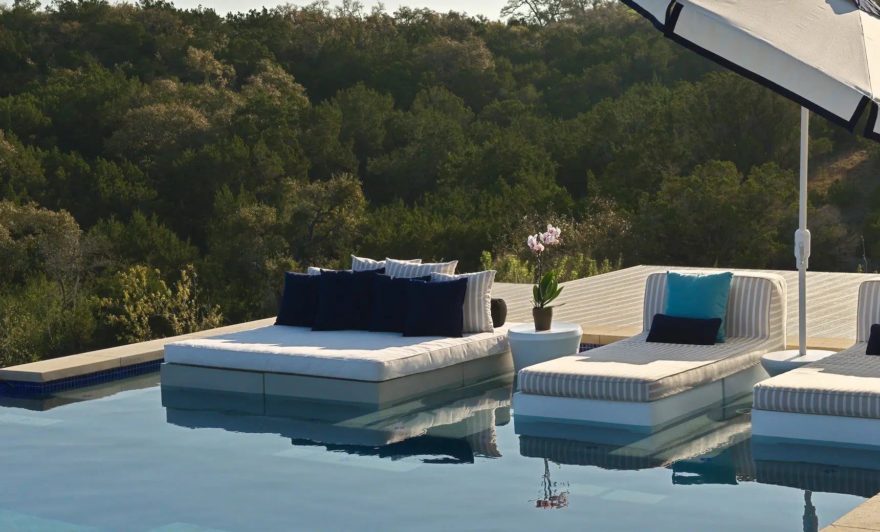Affinity Square sunbed featuring a flat cushion design for comfortable lounging.