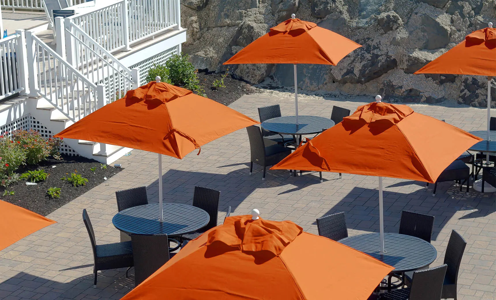 7.5-foot octagonal crank auto tilt essential fiberglass umbrella with black canopy and wooden ribs
