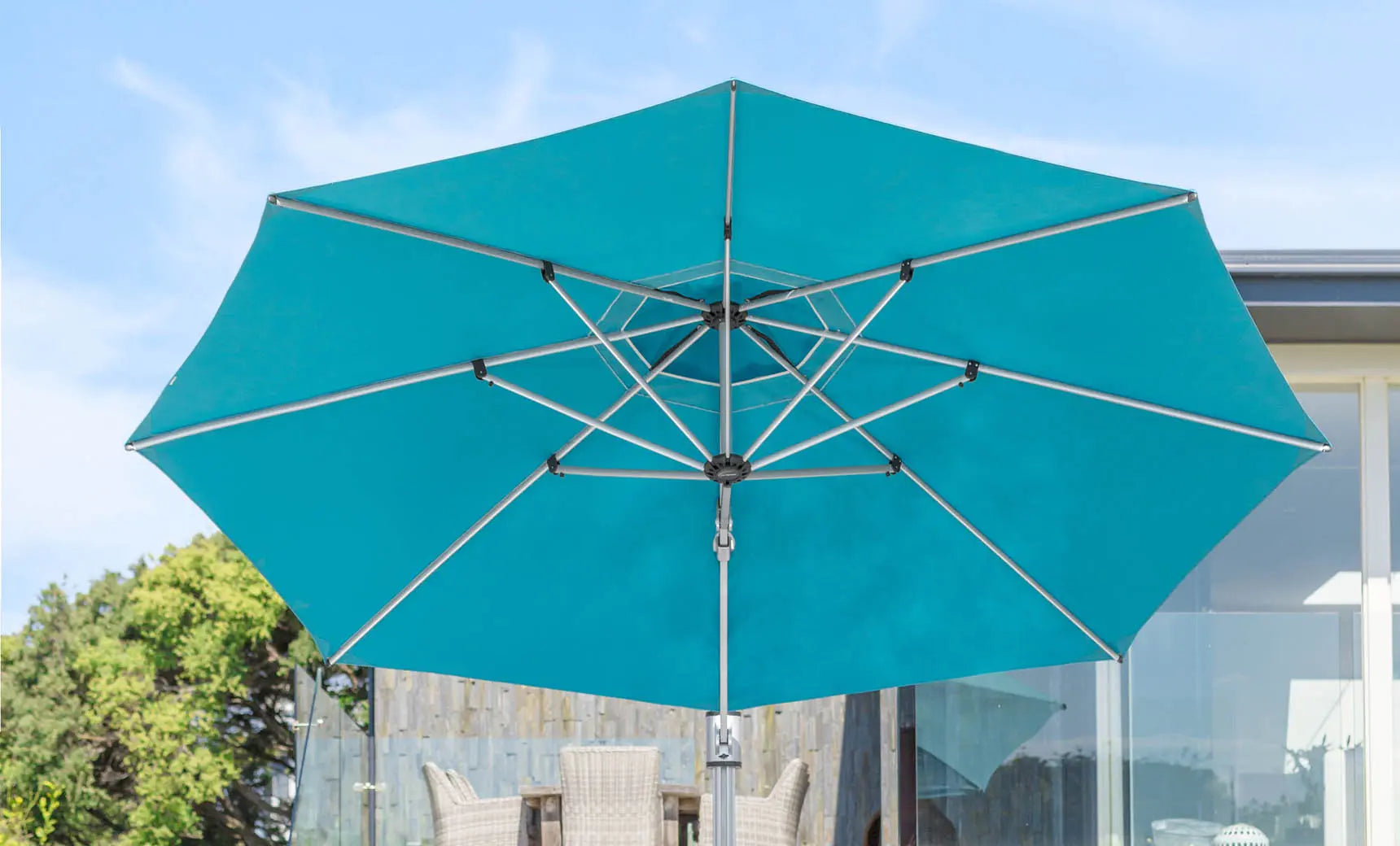 13-foot octagonal umbrella with cantilever design for outdoor use.