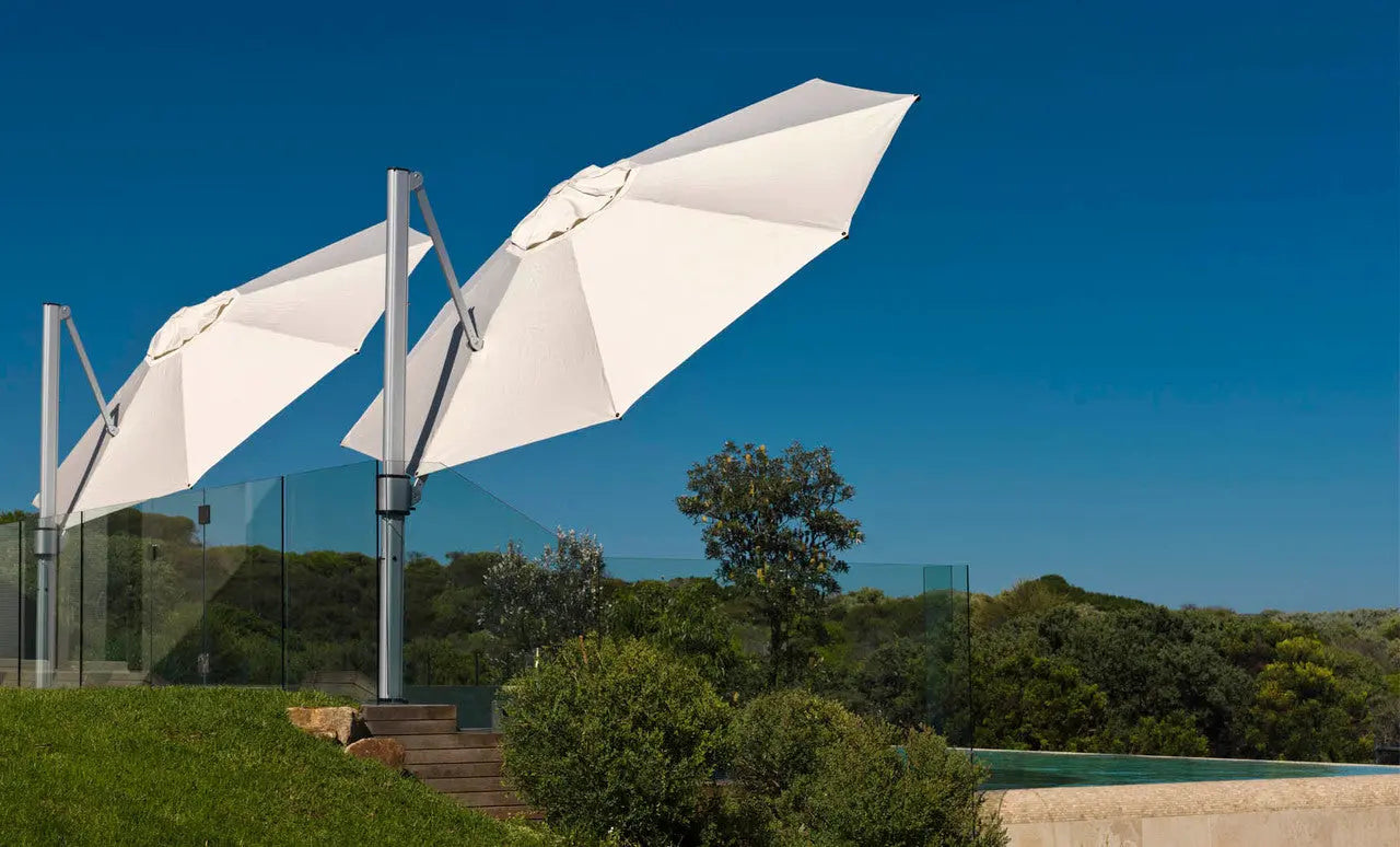 11-foot octagon-shaped Ultra Cantilever umbrella in black with silver poles and base
