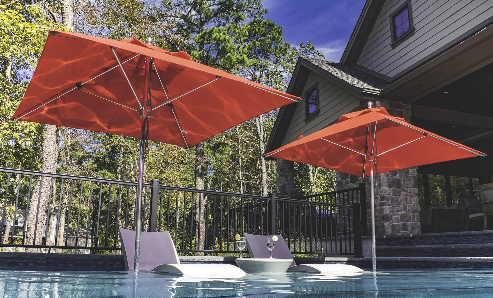 13-foot octagonal Premier Umbrella with a black canopy and wooden frame.