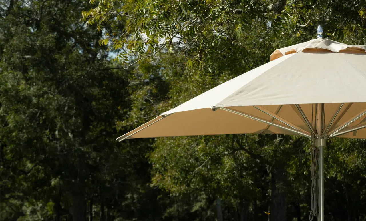 9-foot octagonal Premier Umbrella with a black canopy and wooden frame