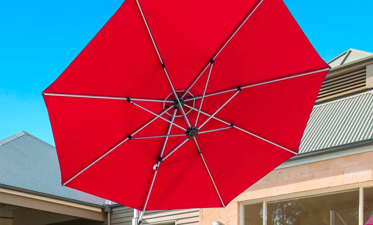 11-foot octagonal umbrella with black cantilever design and clear canopy