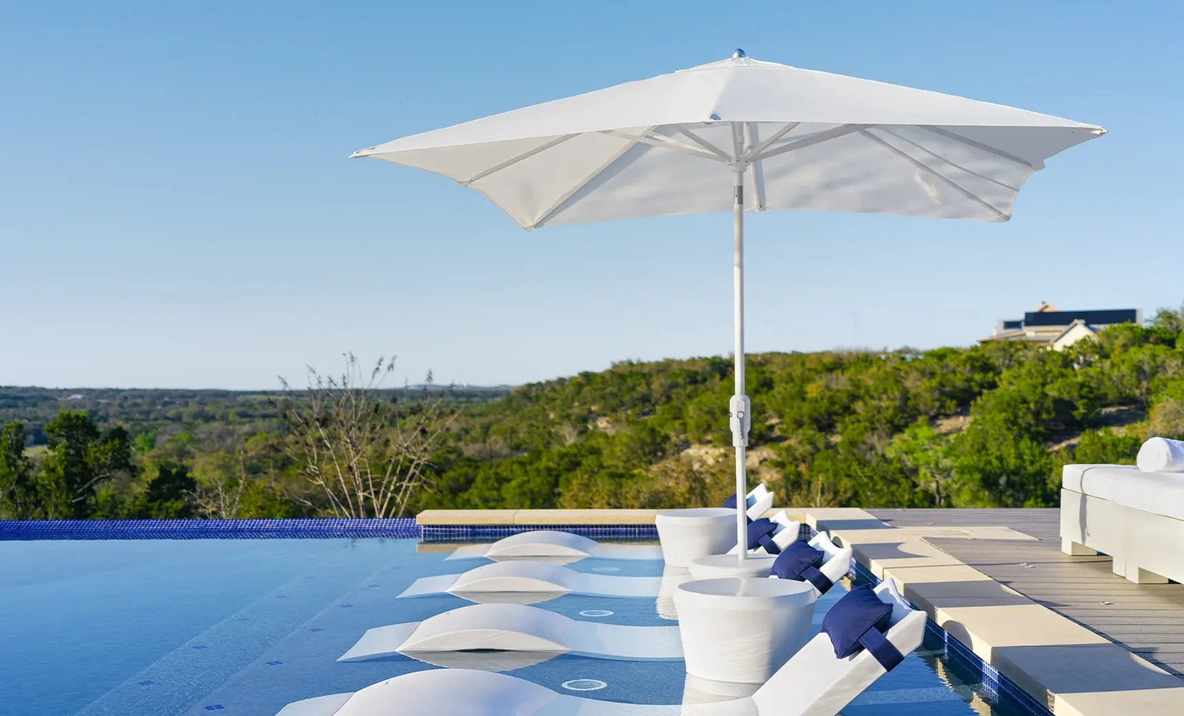 7.5-foot octagonal Signature 360° tilt umbrella in dark brown with black ribs and base