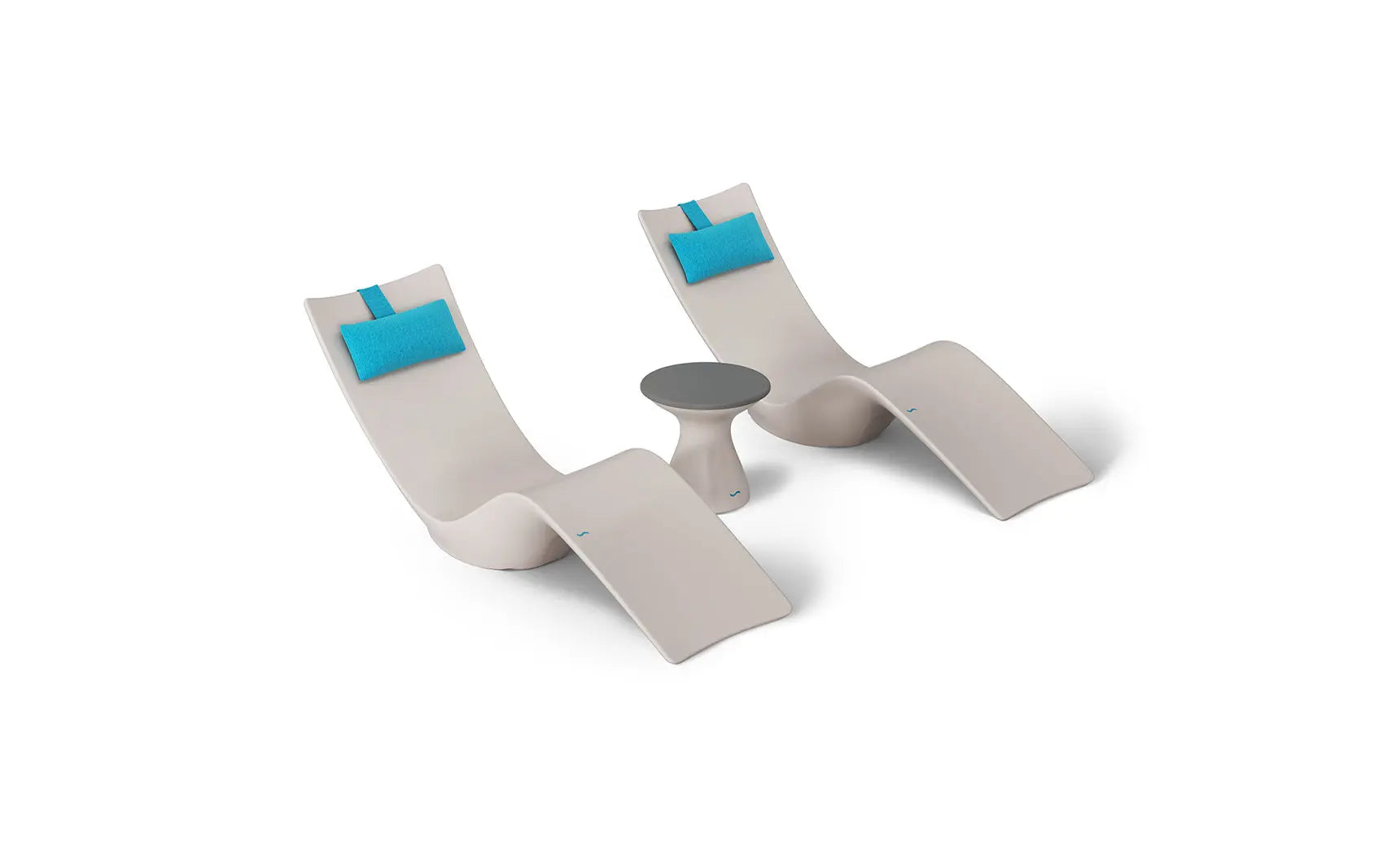 Autograph chaise lounge chair paired with a matching side table designed for poolside use.
