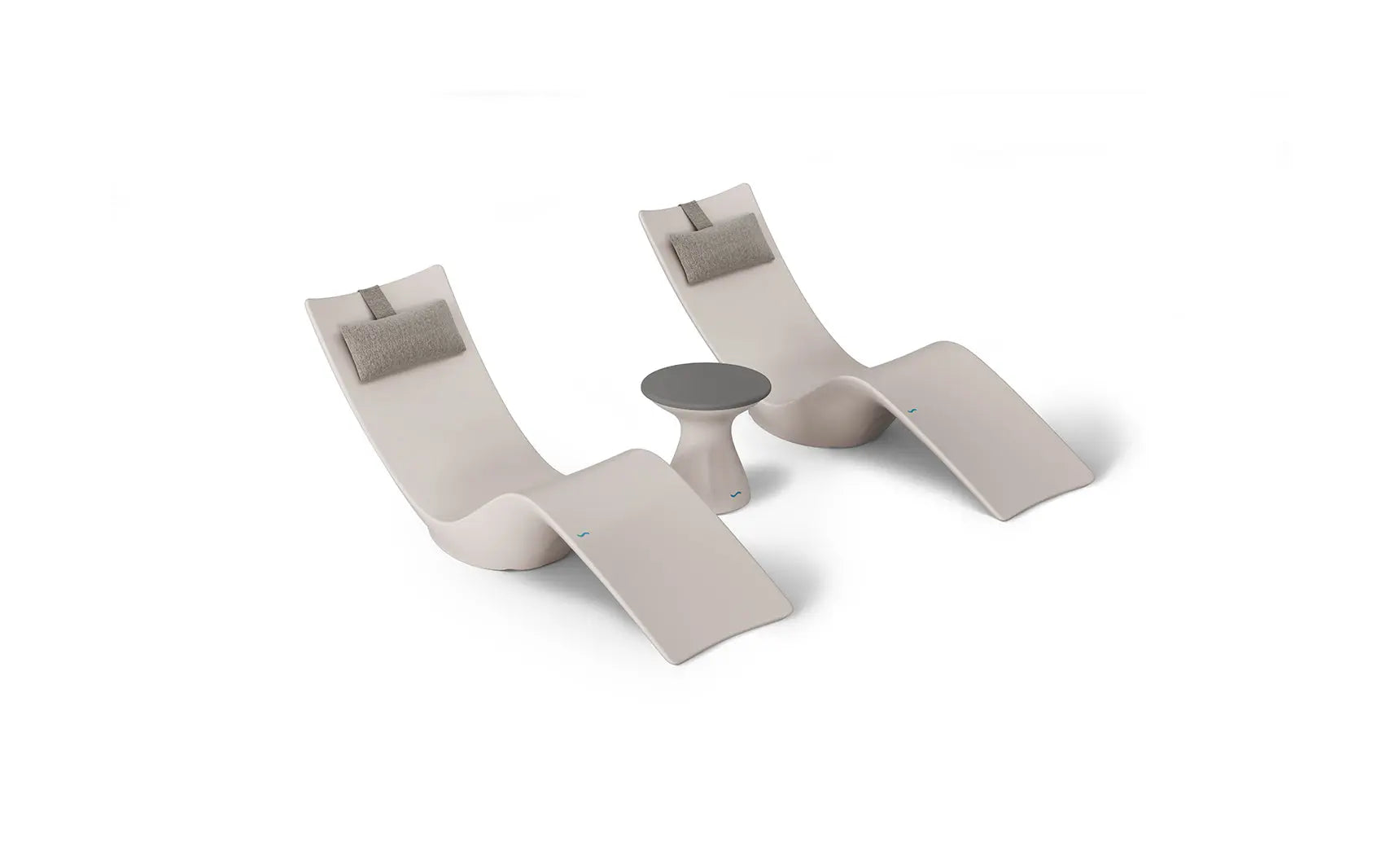 Autograph chaise lounge chair paired with a matching side table designed for poolside use.