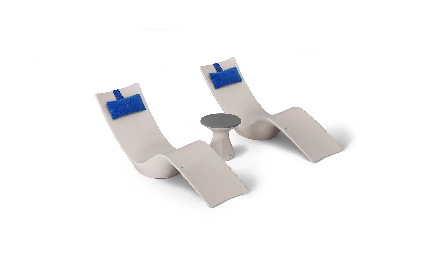 Autograph chaise lounge chair paired with a matching side table designed for poolside use.