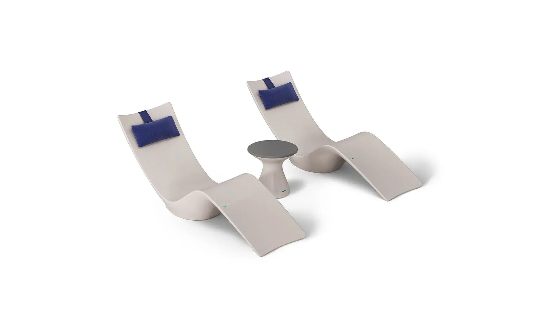 Autograph chaise lounge chair paired with a matching side table designed for poolside use.