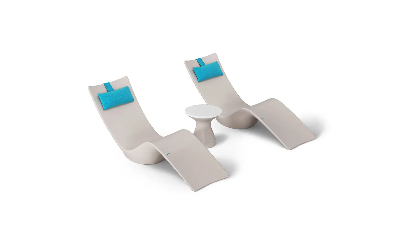 Autograph chaise lounge chair paired with a matching side table designed for poolside use.