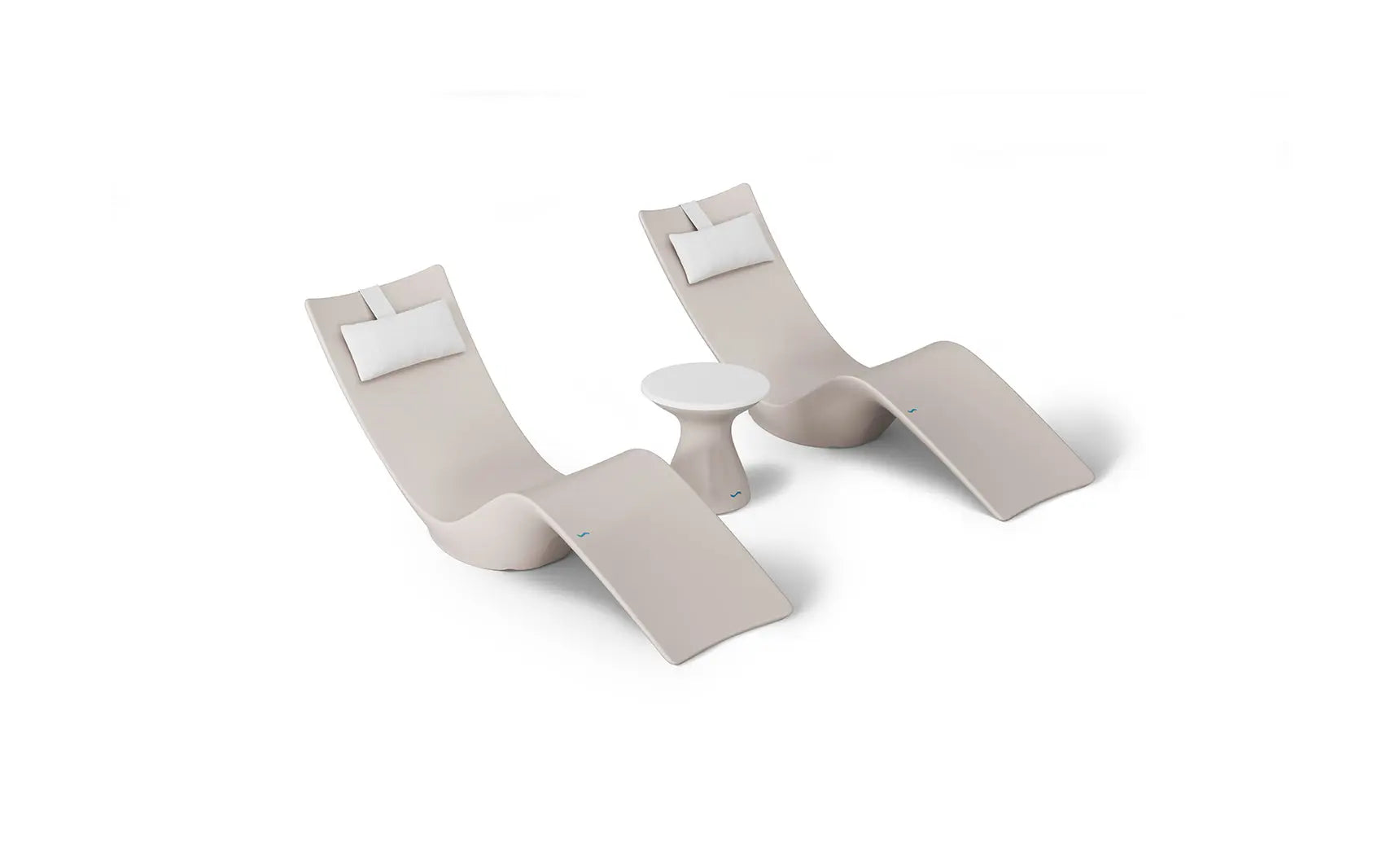 Autograph chaise lounge chair paired with a matching side table designed for poolside use.
