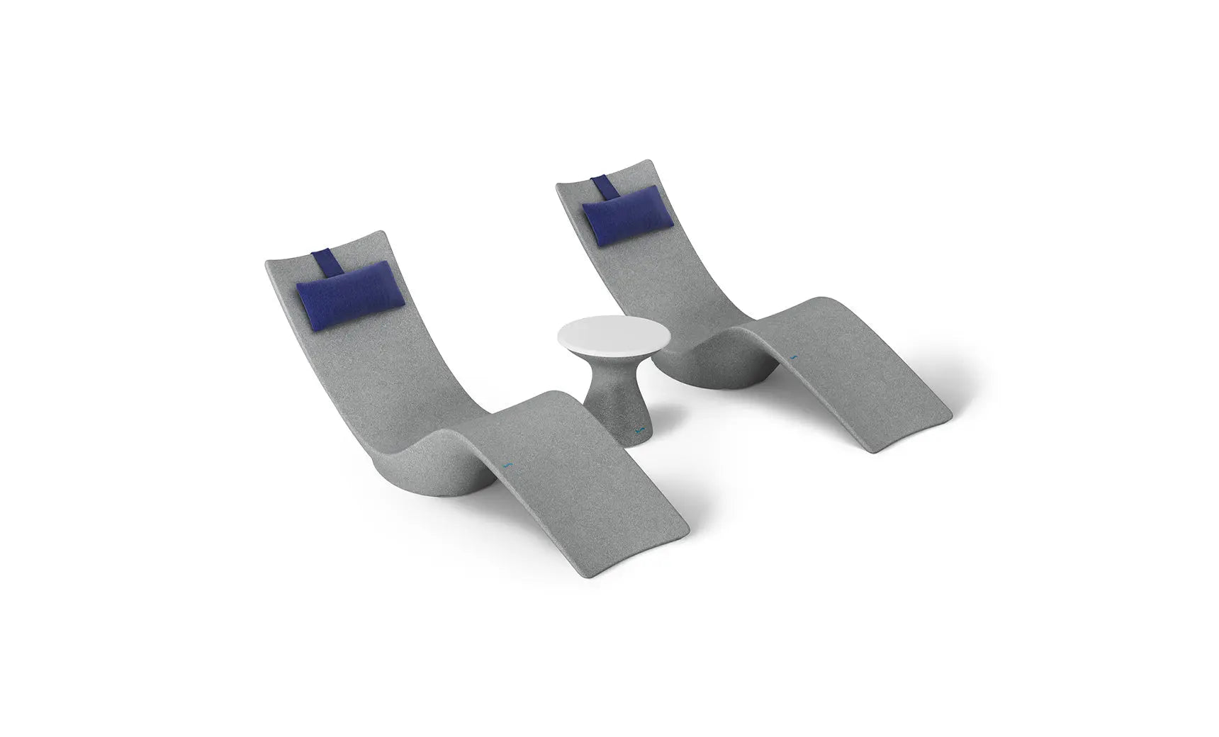 Autograph chaise lounge chair paired with a matching side table designed for poolside use.