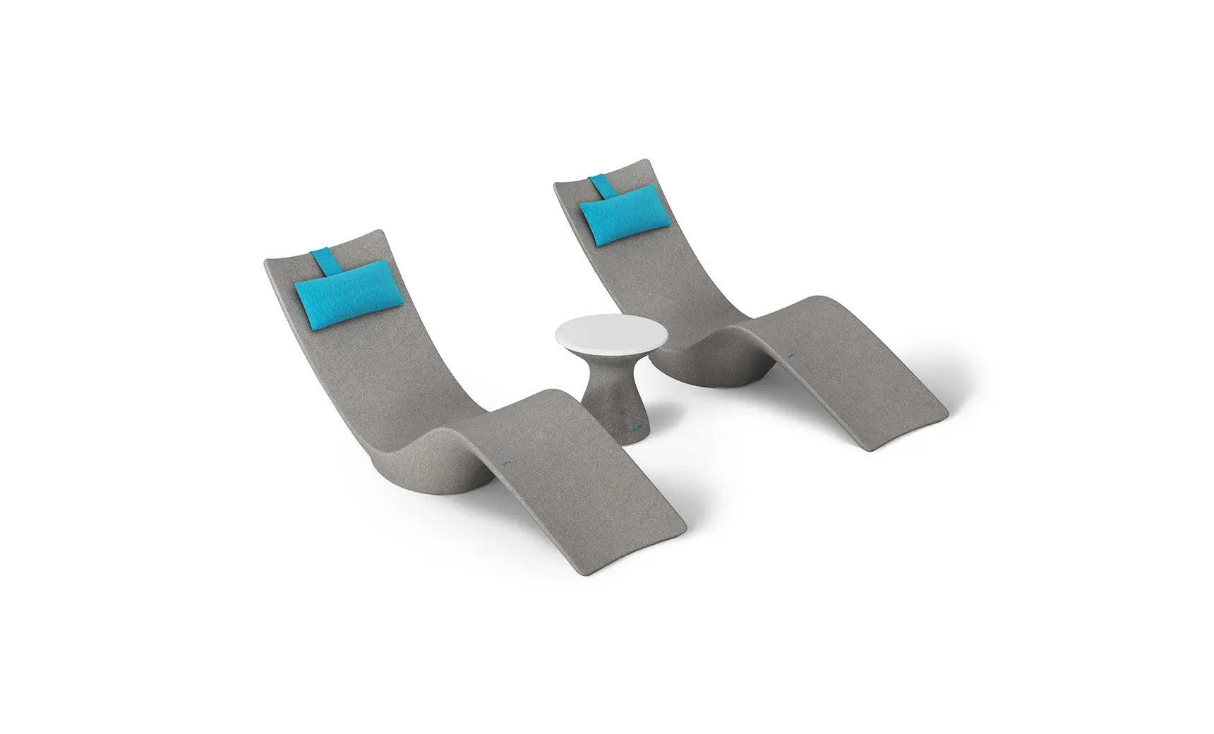 Autograph chaise lounge chair paired with a matching side table designed for poolside use.