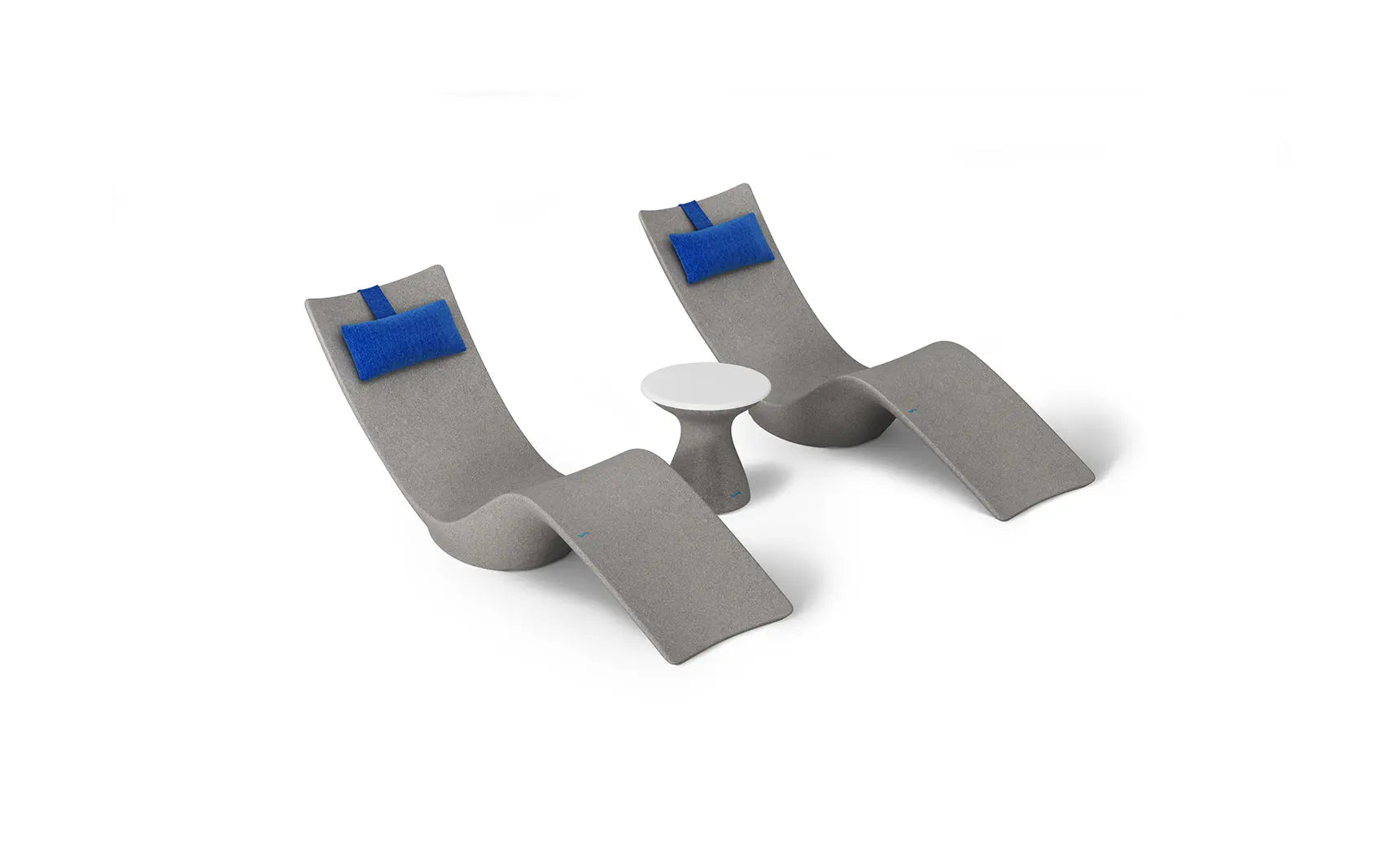 Autograph chaise lounge chair paired with a matching side table designed for poolside use.