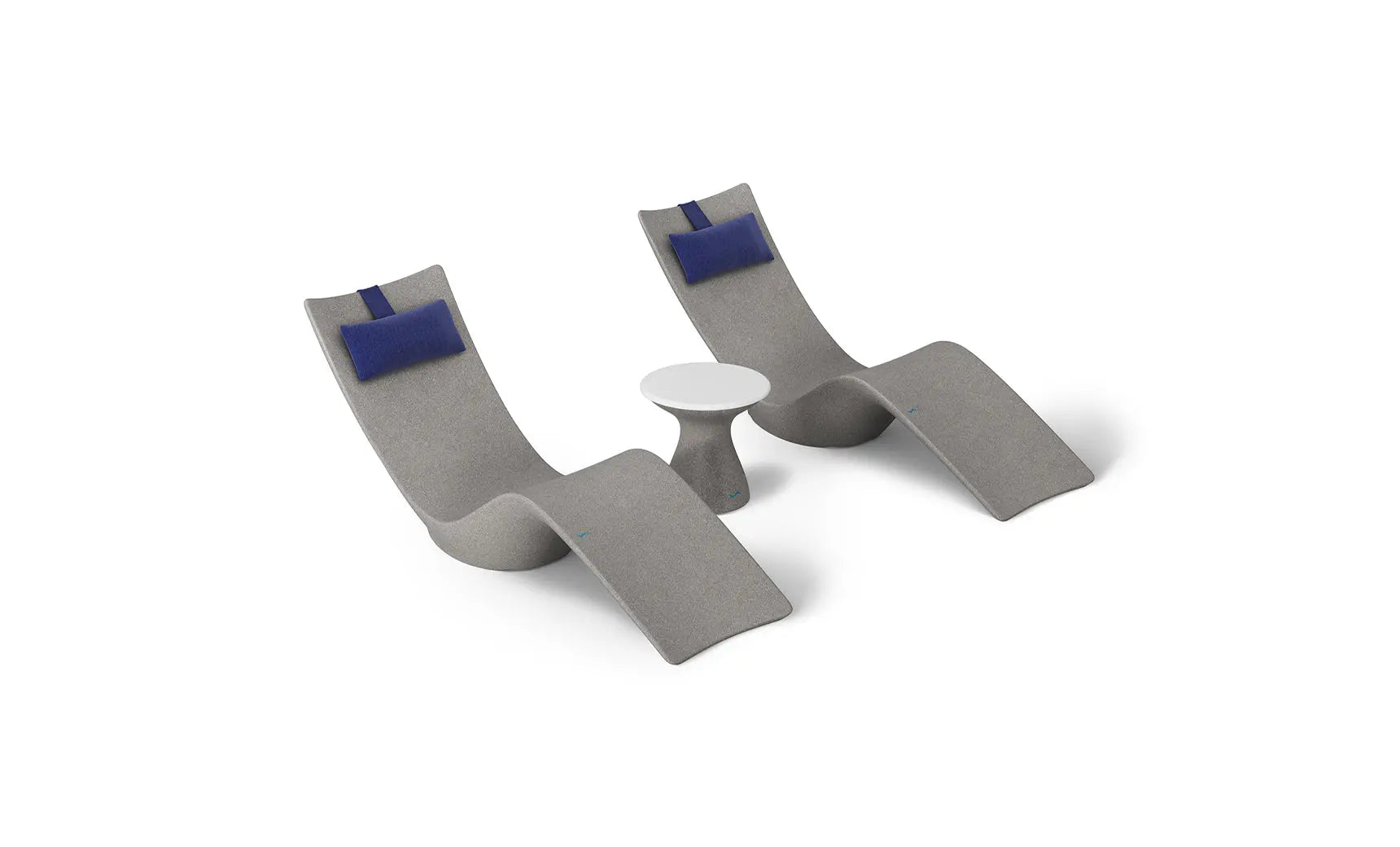 Autograph chaise lounge chair paired with a matching side table designed for poolside use.