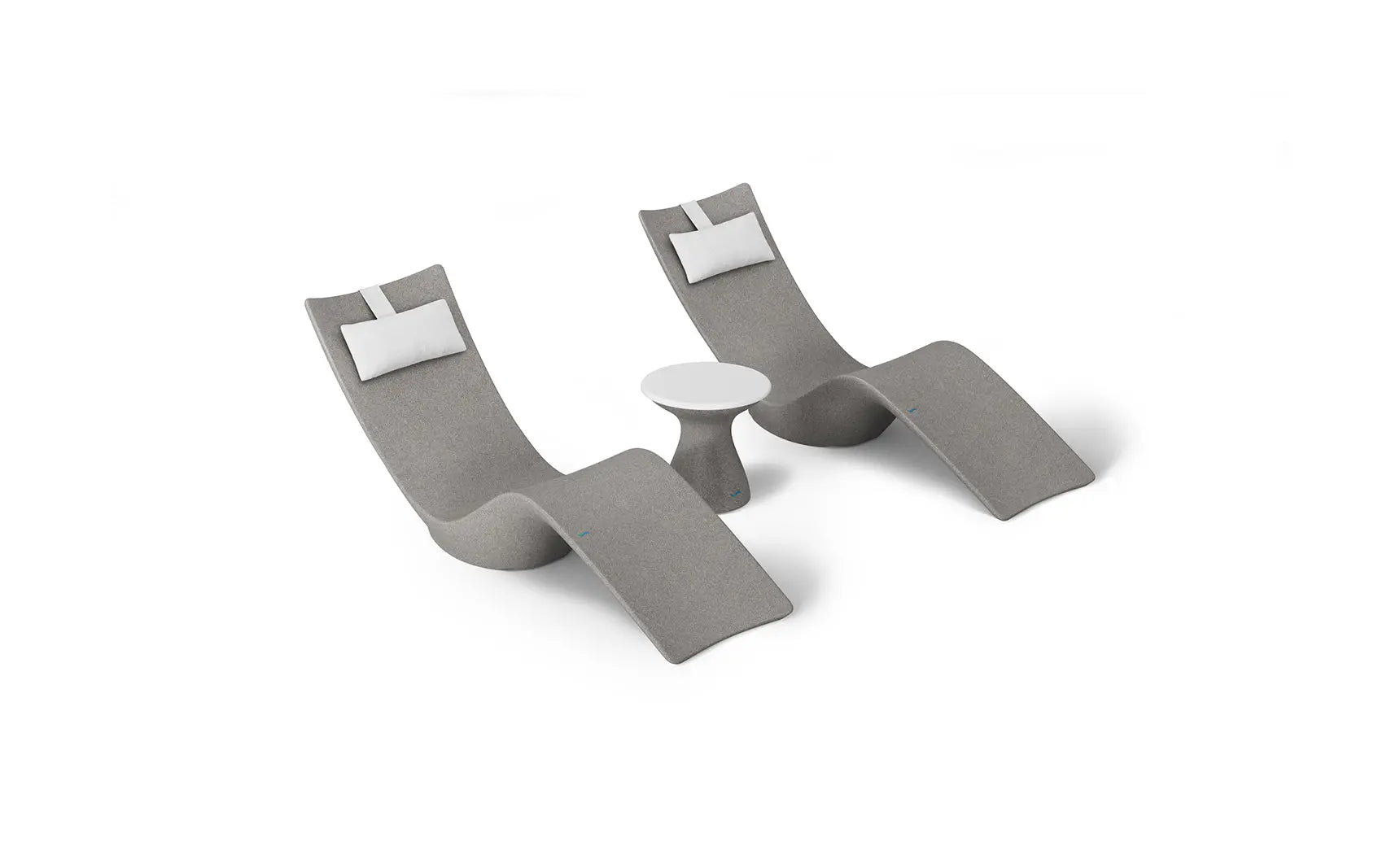 Autograph chaise lounge chair paired with a matching side table designed for poolside use.