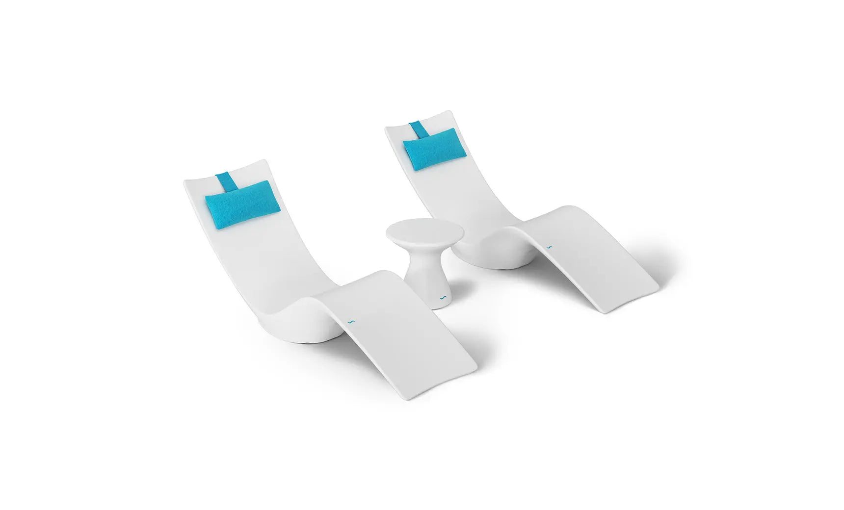 Autograph chaise lounge chair paired with a matching side table designed for poolside use.