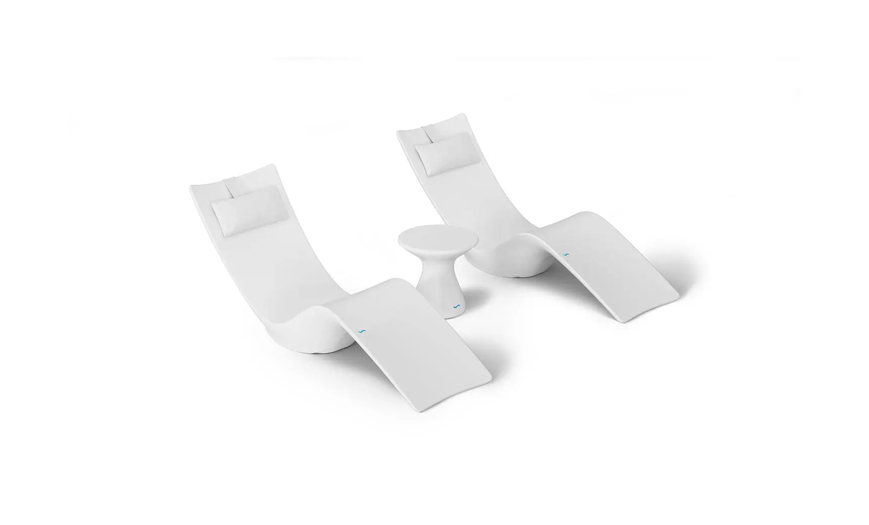 Autograph chaise lounge chair paired with a matching side table designed for poolside use.