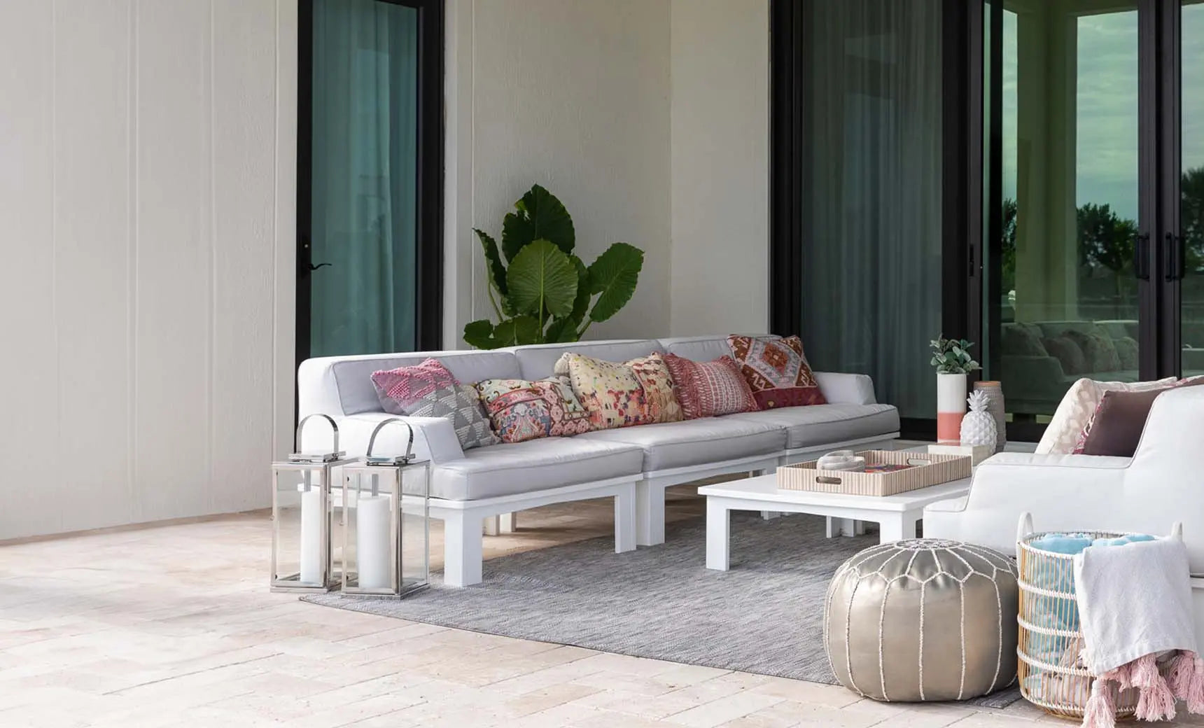 Mainstay sectional sofa in beige fabric with three cushion pieces and curved armrests