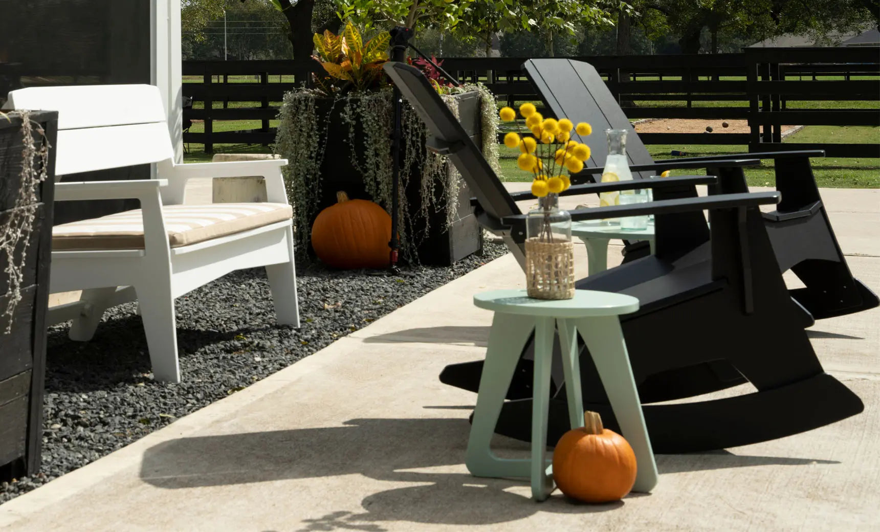 Mainstay metal camping stool with four legs and a seat cushion