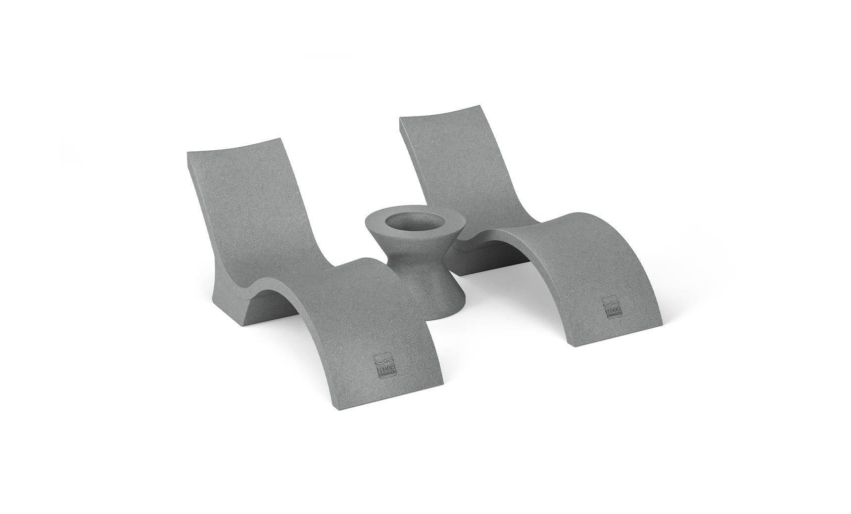 Signature Chaise lounge in pool with matching deep cushion and side table for relaxation.