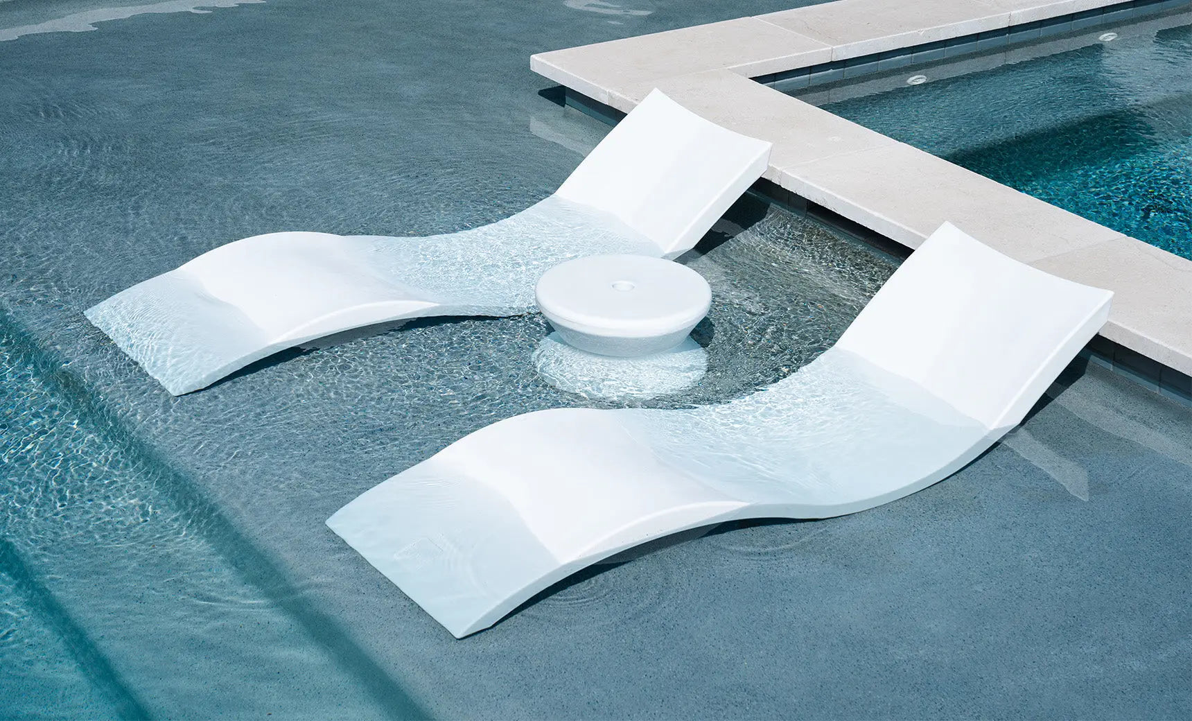 Signature pool chaise lounge set with coordinating side table in a modern design.