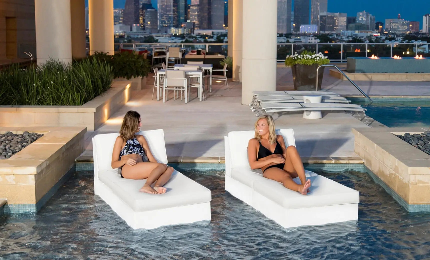 Signature Sectional 2 Piece Sun Chair in beige fabric with curved backrests and armrests.