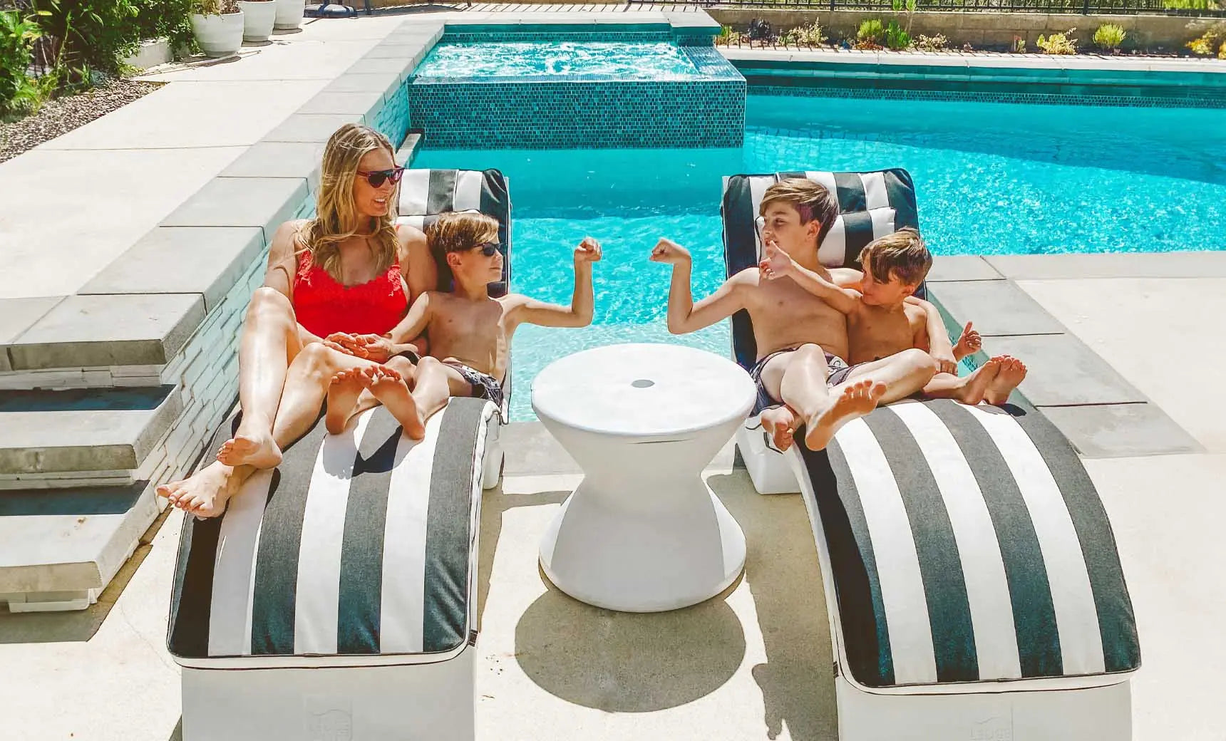 Signature chaise lounge cushion featuring soft, plush fabric in a modern design.
