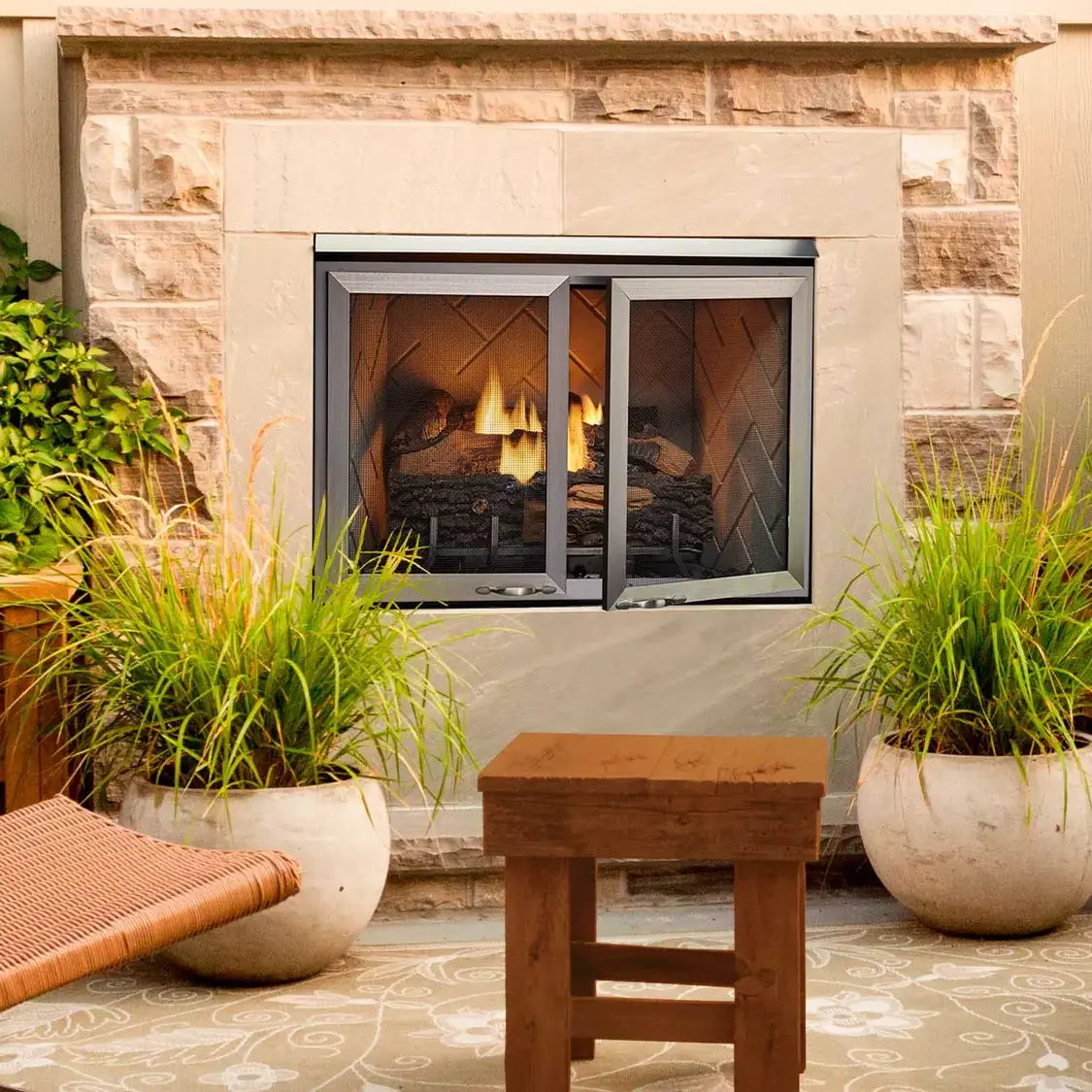 Majestic Vesper 36-inch outdoor ventless gas fireplace with modern design and glass front.