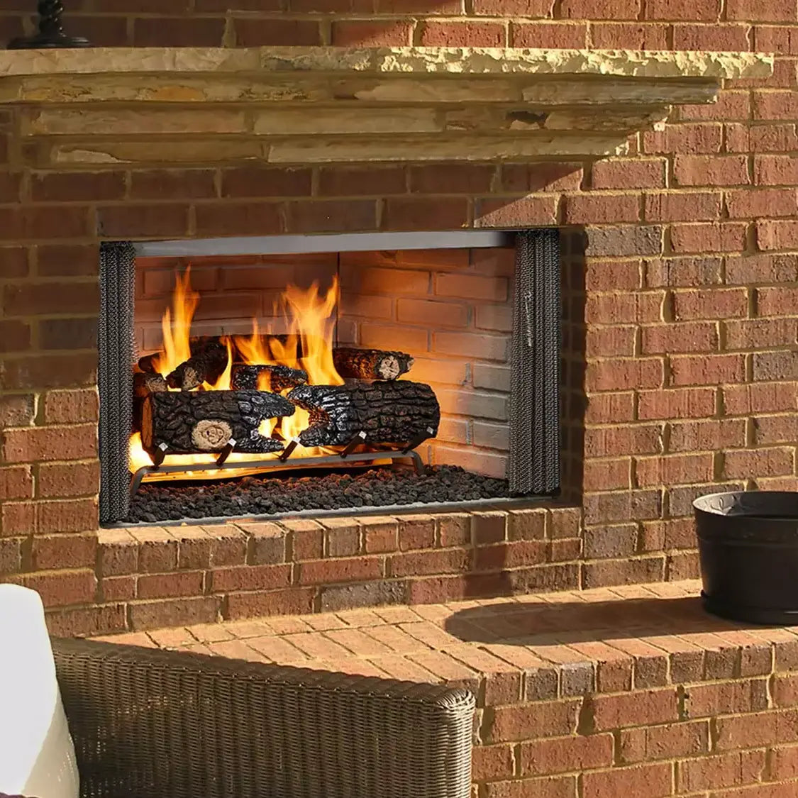 Majestic Villawood 36-inch outdoor wood fireplace with wooden exterior and glass front panel.