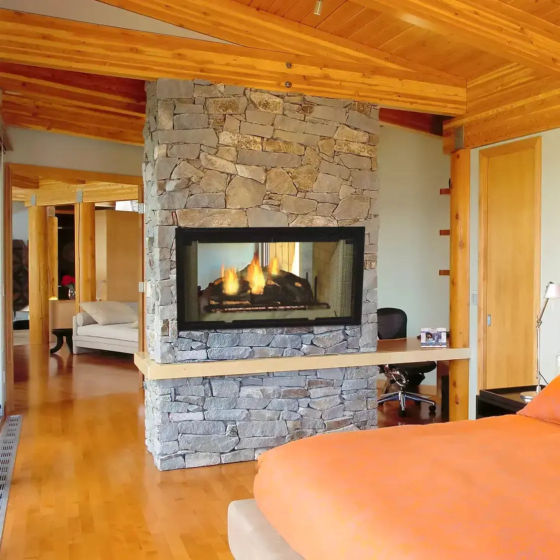 Majestic Designer See-Through 42" radiant wood burning fireplace with glass front and detailed wood design