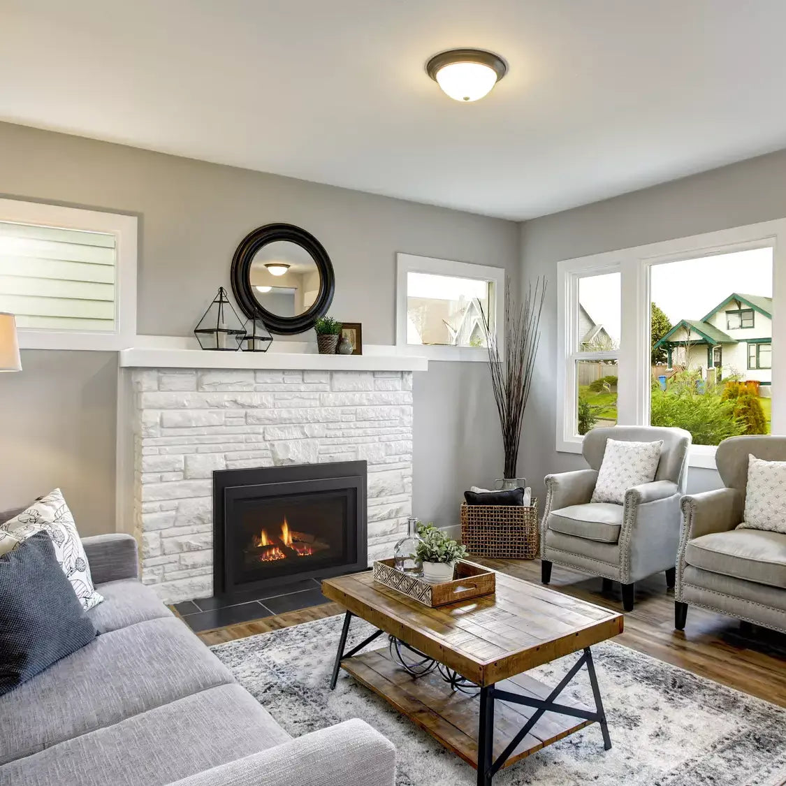 Majestic Jasper 30" direct vent gas fireplace insert with stone surround and glass front