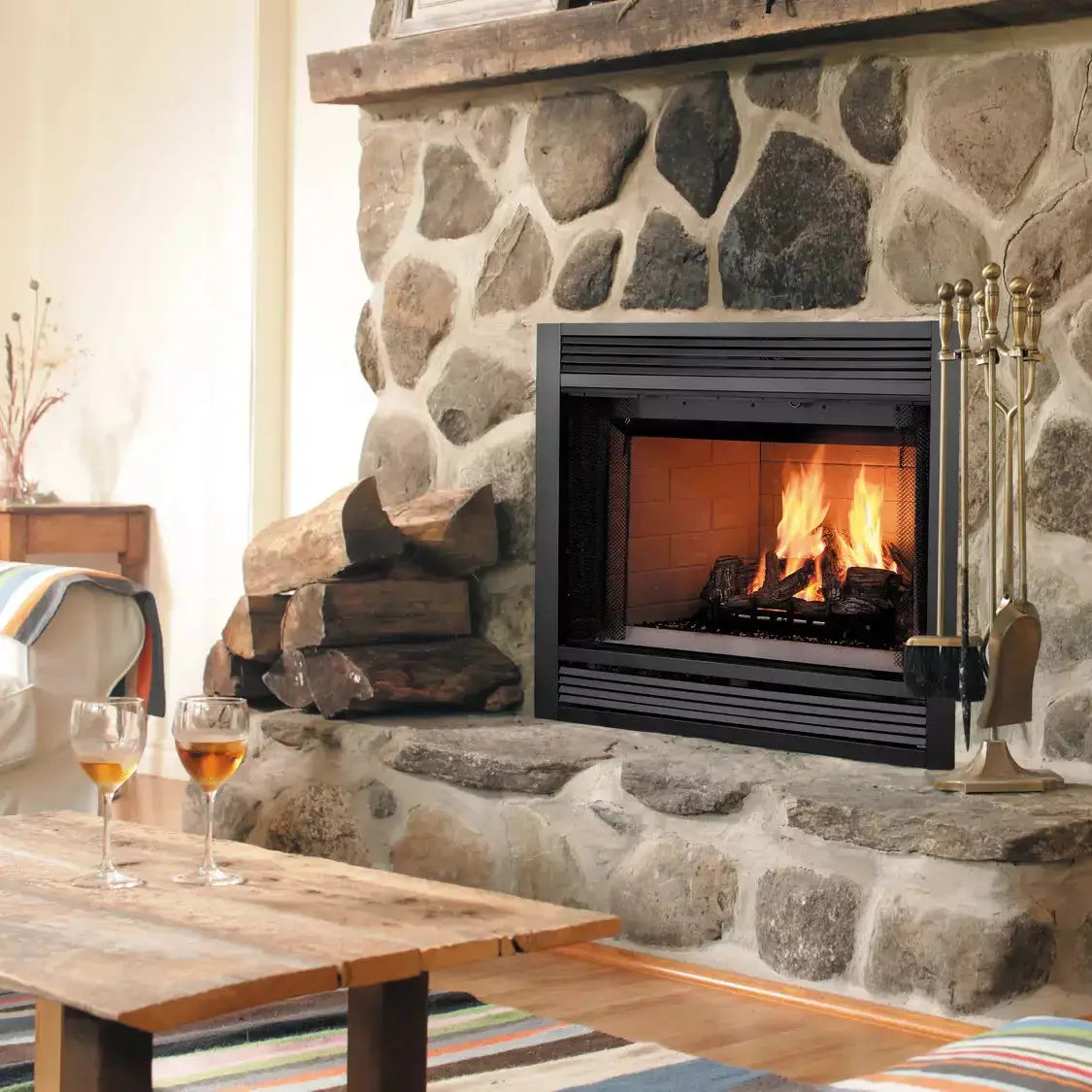 Majestic Sovereign 36-inch wood burning fireplace with detailed carvings and glass doors