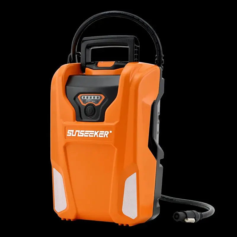 Orange pressure washer with black accents on a white background
