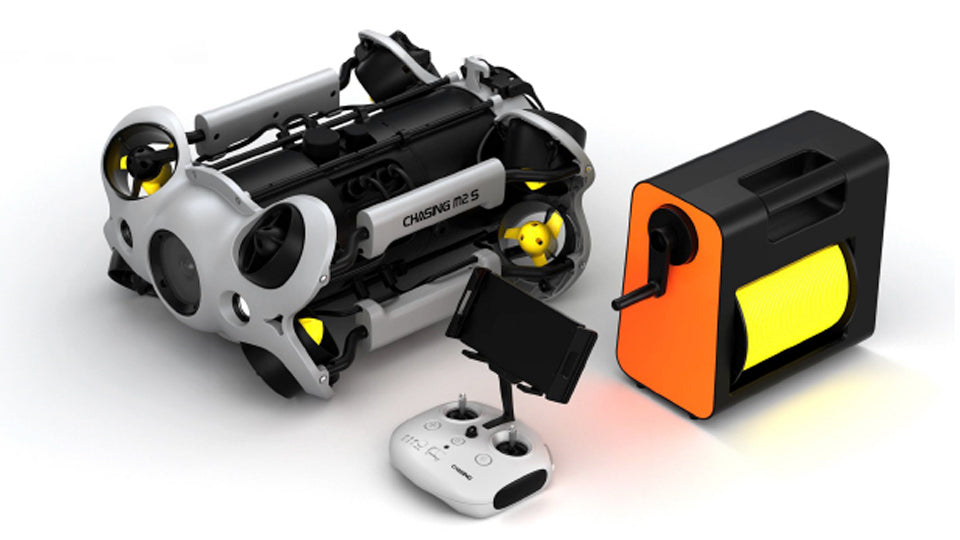 Chasing M2 S underwater ROV drone with open-body design floating in clear blue ocean water