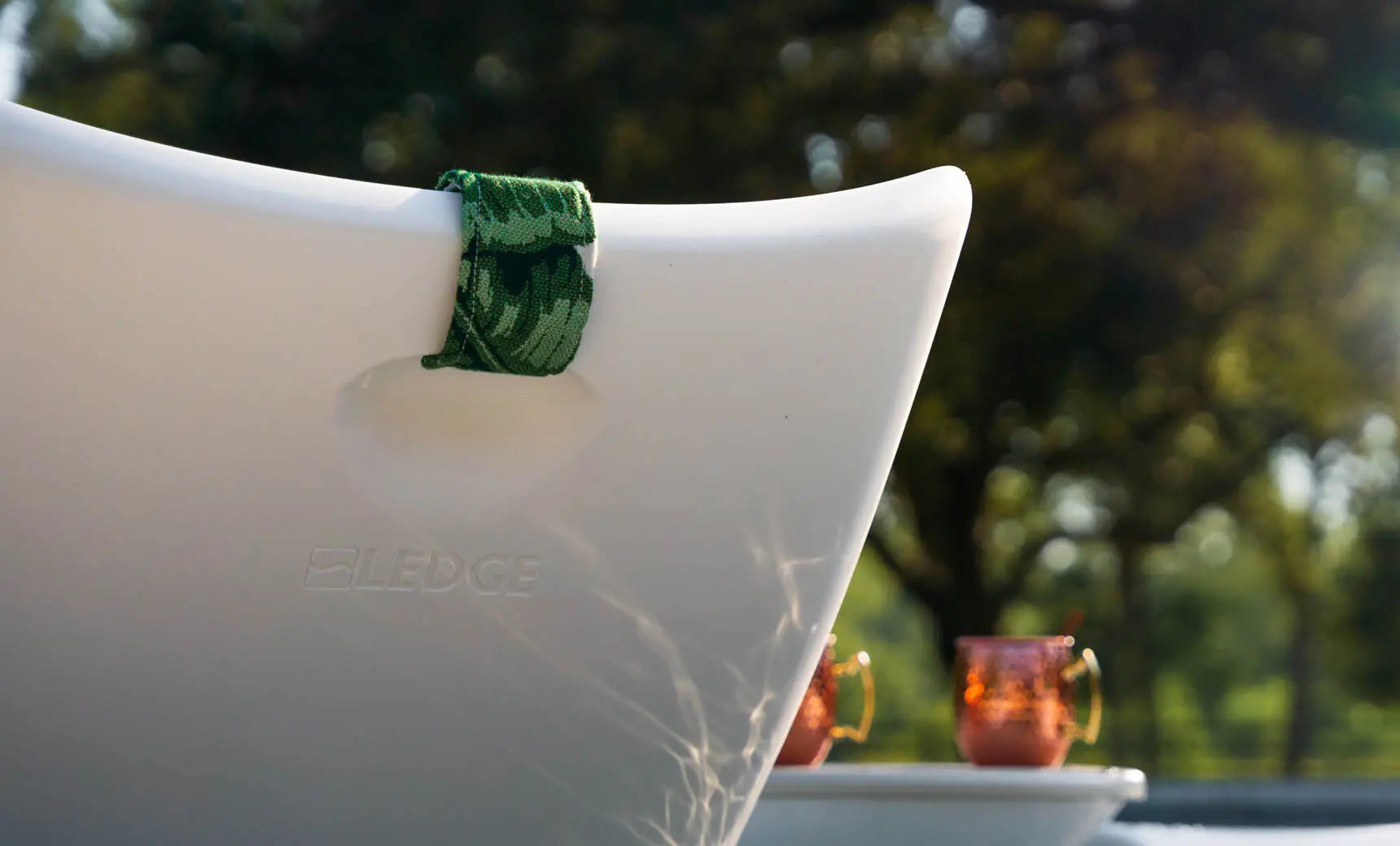 Autograph headrest pillow with soft fabric and adjustable design for comfortable travel.