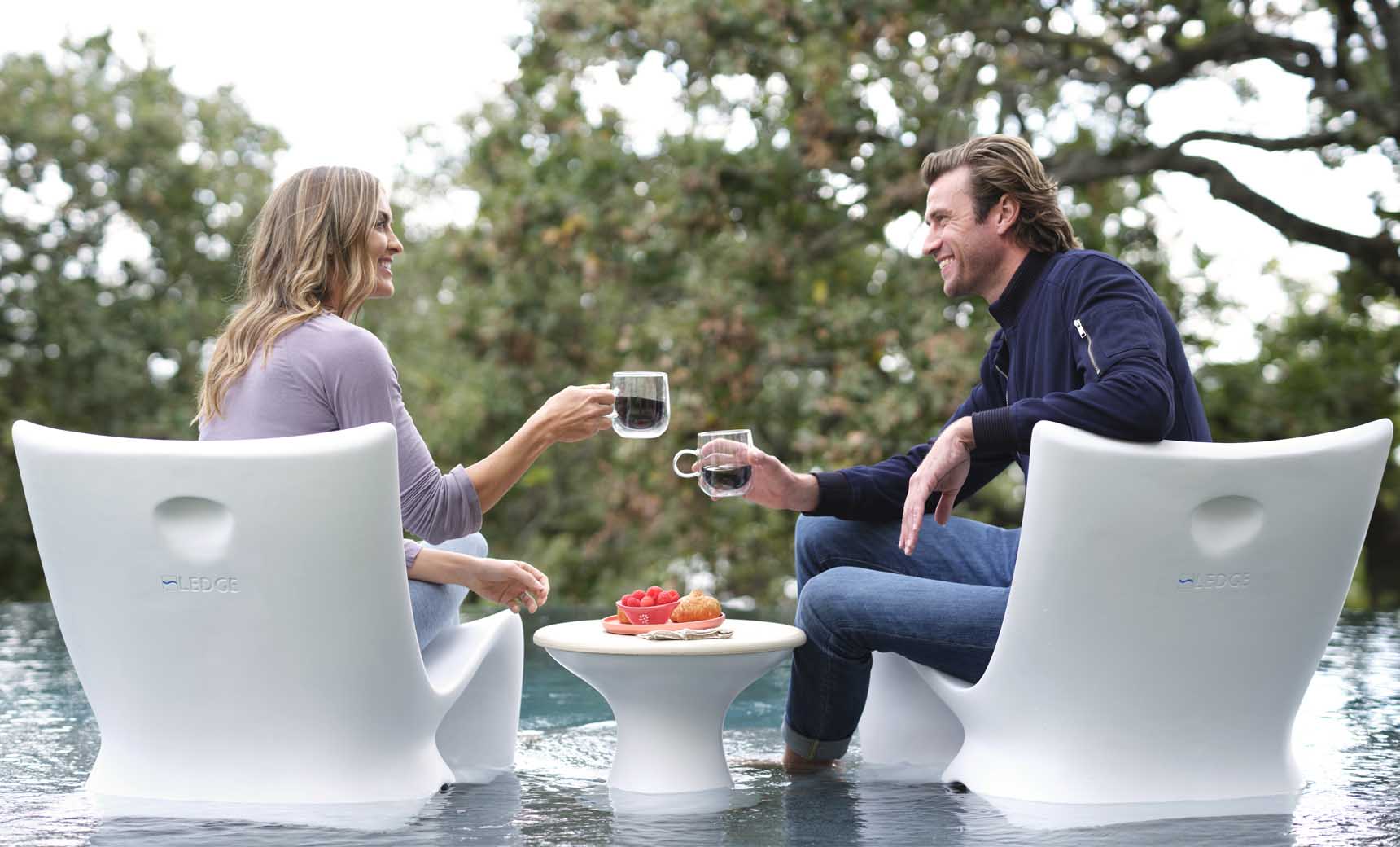 Autograph chair paired with a matching side table in a modern design.