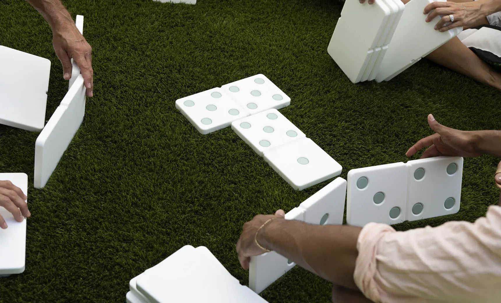 Dominoes tile set featuring classic black and bone white domino pieces.