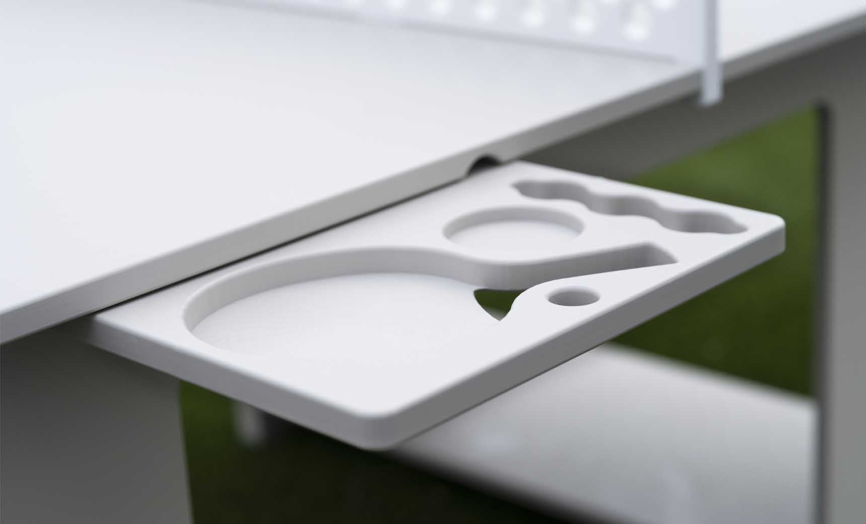 Table tennis set including racket, balls, and net stand in a travel case.