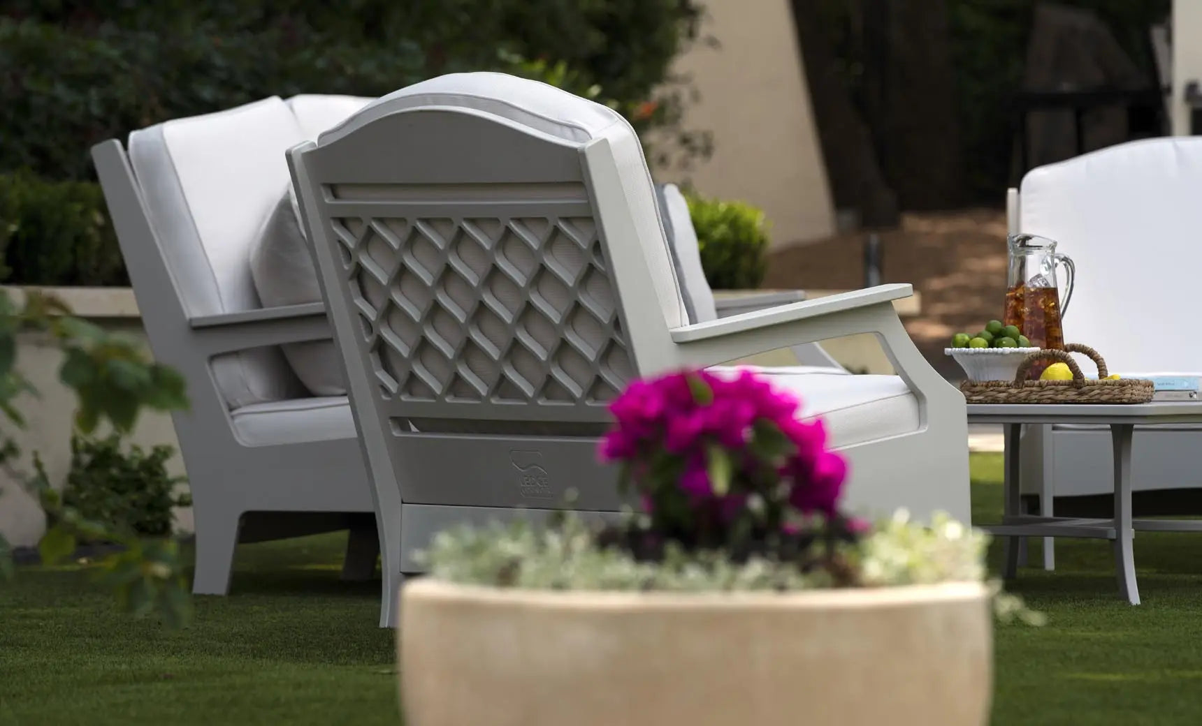Legacy Club Chair in dark brown leather with curved arms and high backrest