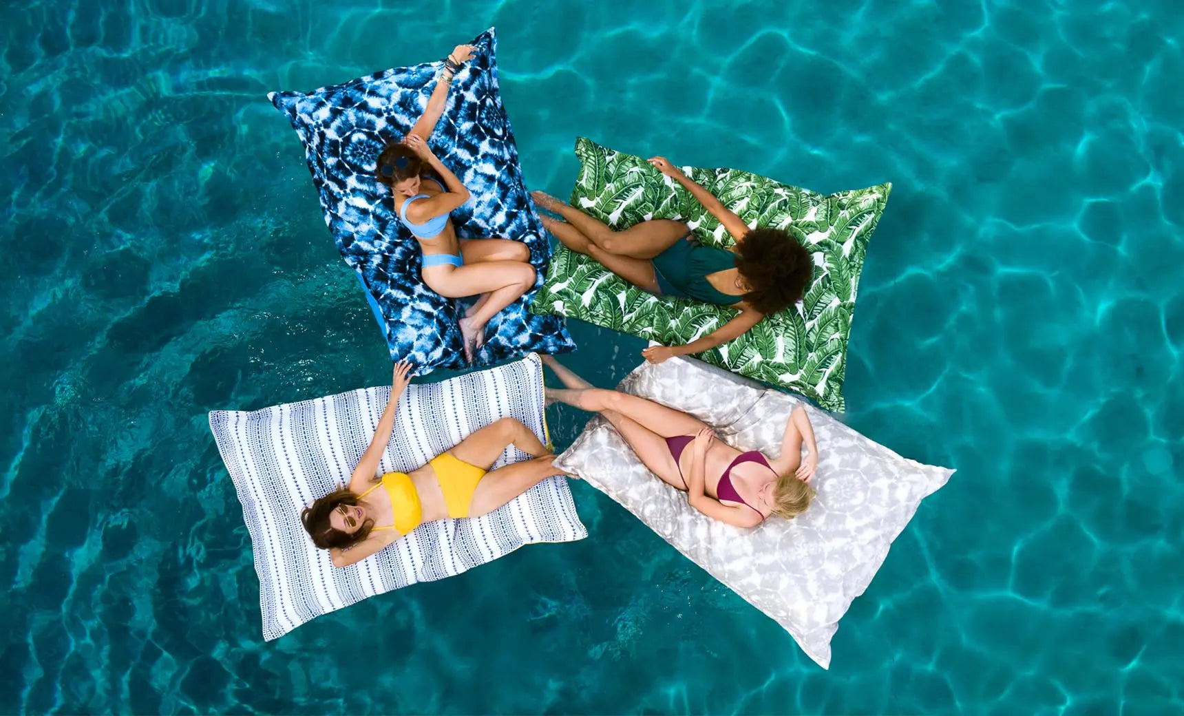 Laze Pillow in soft fabric design with a contoured shape for comfortable lounging.