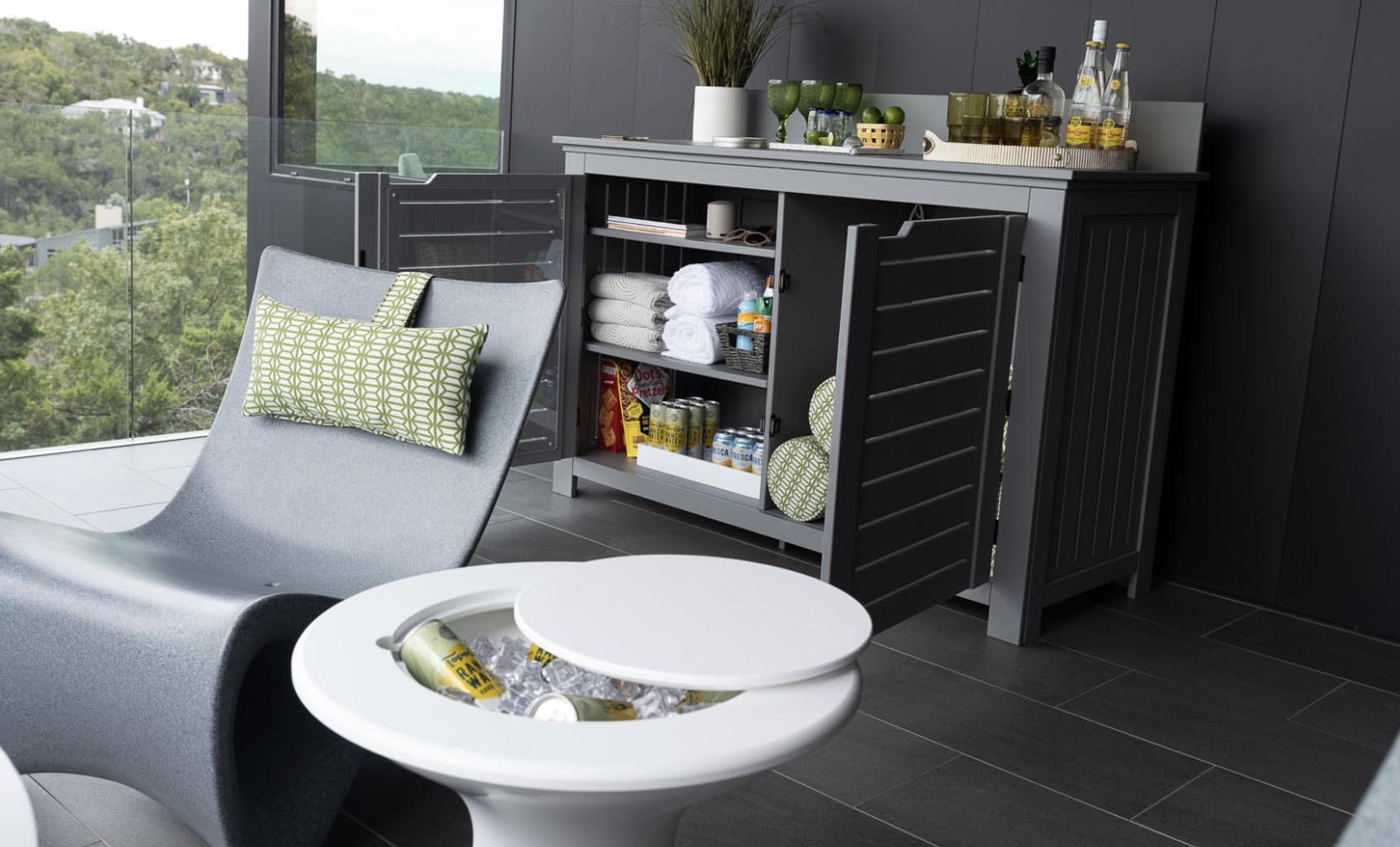 Mainstay bar credenza with wooden finish, glass doors, and drawers below.